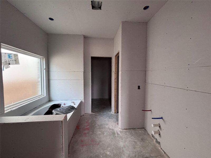 In-progress construction of a new home in The Colony, Bastrop, TX (Image 12).