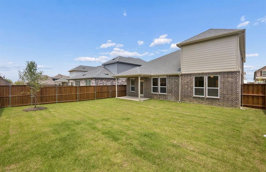 Oversized fenced in backyard