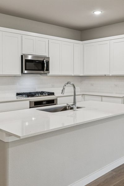 First Floor in the Oscar home plan by Trophy Signature Homes – REPRESENTATIVE PHOTO First Floor in the Oscar home plan by Trophy Signature Homes – REPRESENTATIVE PHOTO