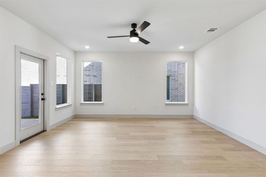 This spacious light filled family room offers a delightful space to entertain family and friends. This spacious light filled family room offers a delightful space to entertain family and friends.