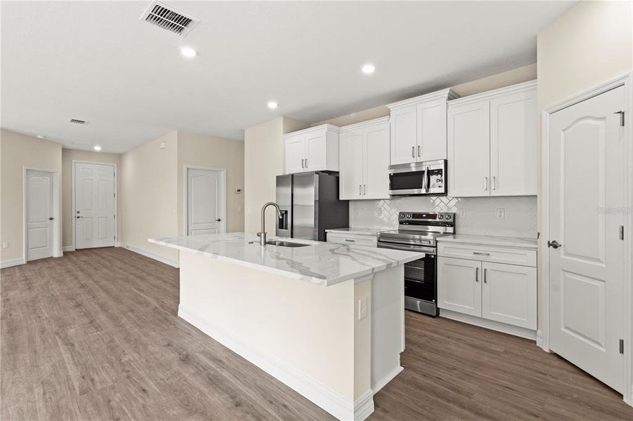Furnished interior view inside a new home in , Leesburg (Image 8). Furnished interior view inside a new home in , Leesburg (Image 8).