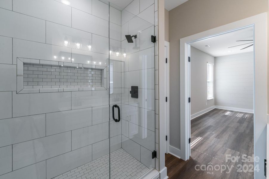 Primary Bathroom: ALL Pics are of Previous Builds and are For Visual Purposes Only. We have built this plan with many different added upgrades and add-on finishes for the Exterior and Interior. Final Price TBD based on the added cost of buyers' selected upgrades and finishes.