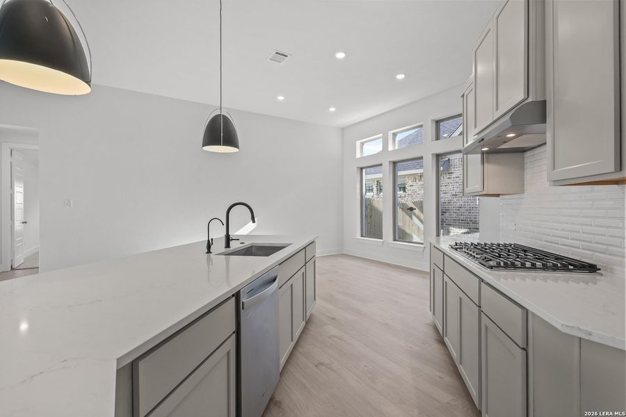 Furnished interior view inside a new home in Nopal Valley, San Antonio (Image 7).