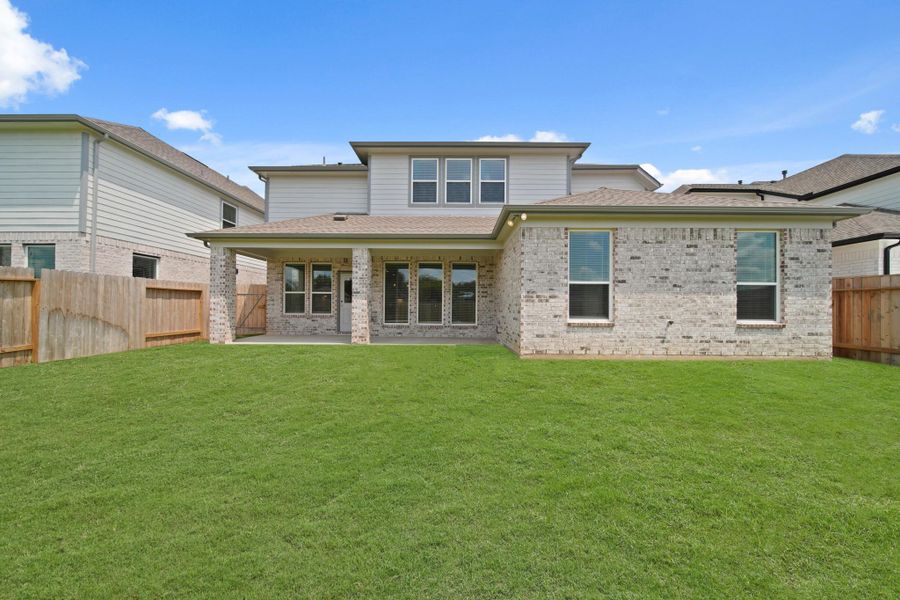 Front exterior of a new home in Morton Creek Ranch, Katy, TX, highlighting curb appeal (Image 19). Front exterior of a new home in Morton Creek Ranch, Katy, TX, highlighting curb appeal (Image 19).