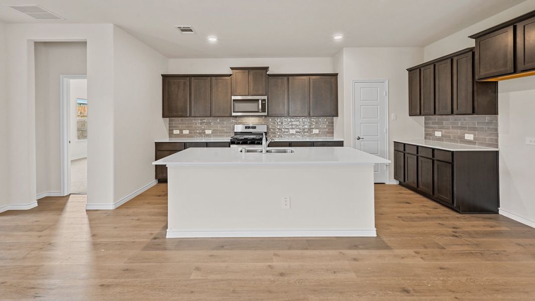 Furnished interior view inside a new home in Fireside by the Lake, Garland (Image 9).