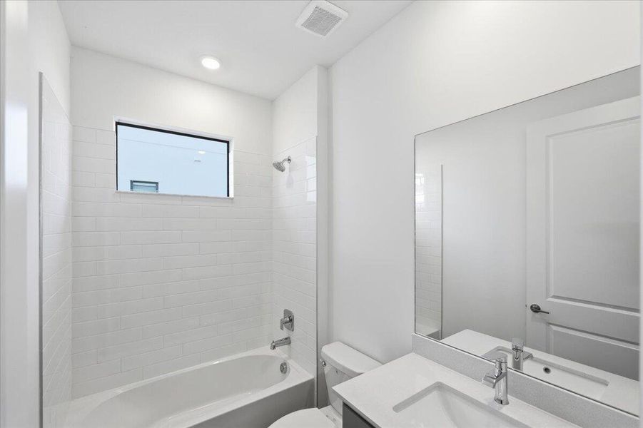 This new single-story home provides ease-of-living with ample room to grow. Down the foyer is a shared open-concept layout situated between the kitchen, dining room and Great Room, with glass-sliders leading out to the covered lanai. On the opposite side of the home are three secondary bedrooms and a privately situated owner’s suite with an adjoining bathroom. A versatile two-car garage provides storage room. Prices, dimensions and features may vary and are subject to change. Photos are for illustrative purposes only. This new single-story home provides ease-of-living with ample room to grow. Down the foyer is a shared open-concept layout situated between the kitchen, dining room and Great Room, with glass-sliders leading out to the covered lanai. On the opposite side of the home are three secondary bedrooms and a privately situated owner’s suite with an adjoining bathroom. A versatile two-car garage provides storage room. Prices, dimensions and features may vary and are subject to change. Photos are for illustrative purposes only.