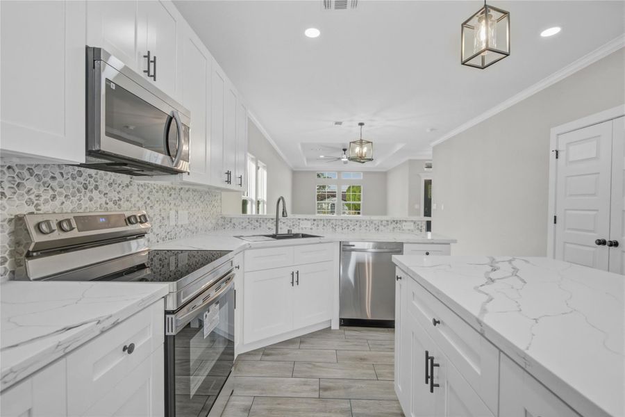 Furnished interior view inside a new home in , Freeport (Image 6).