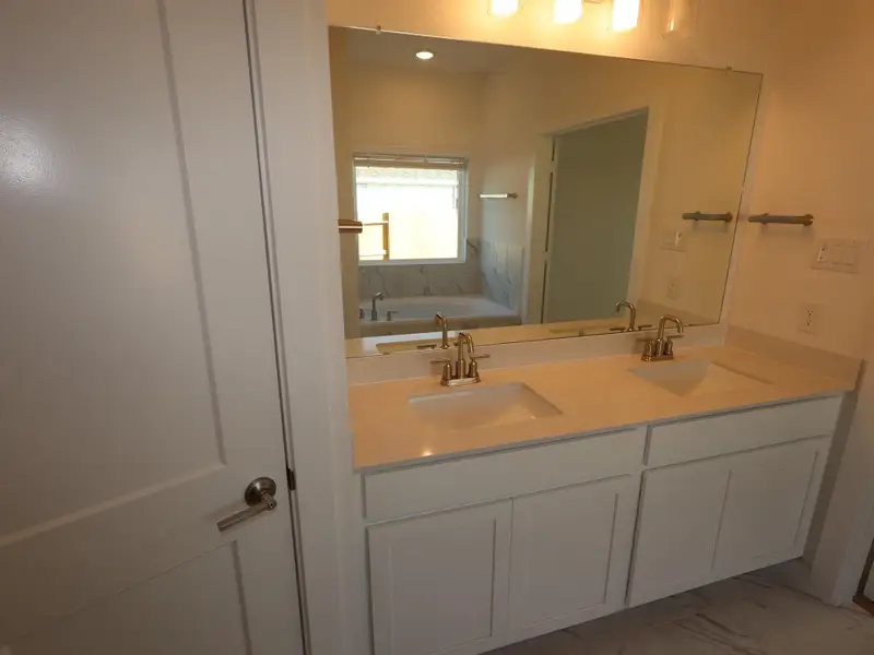 Furnished interior view inside a new home in Marvida, Cypress (Image 11).