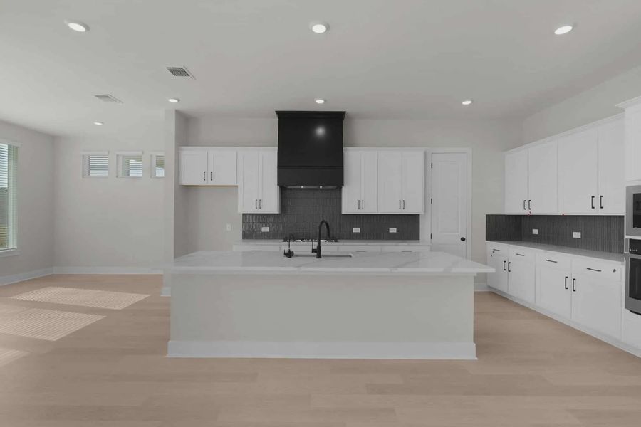 Furnished interior view inside a new home in Berry Creek Highlands, Georgetown (Image 5).