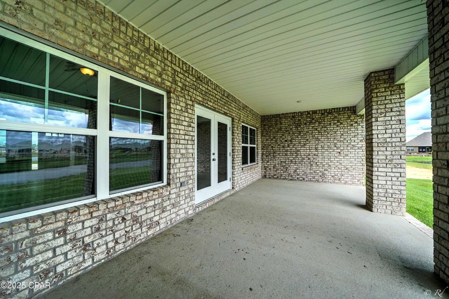 Front exterior of a new home in Cedar Creek at Deerpoint Lake, Panama City, FL, highlighting curb appeal (Image 2). Front exterior of a new home in Cedar Creek at Deerpoint Lake, Panama City, FL, highlighting curb appeal (Image 2).