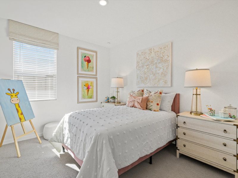 Secondary bedroom in the Arlo floorplan modeled at Teravalis