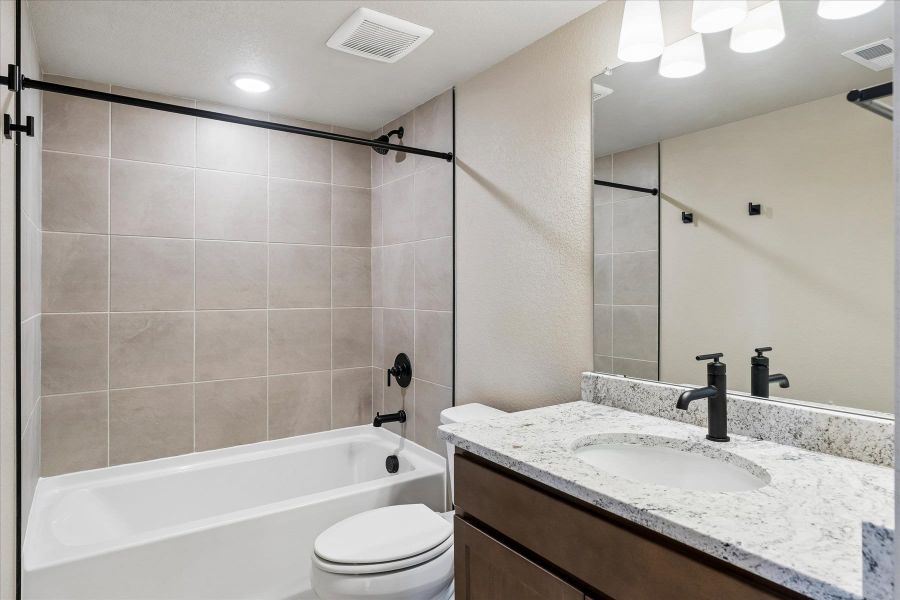 Furnished interior view inside a new home in The Trails at Aspen Ridge, Colorado Springs (Image 10).
