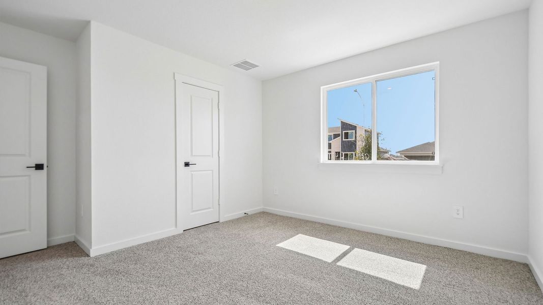 Spacious, unfurnished interior of a new home in Trails at Wildhorse, Austin (Image 32).