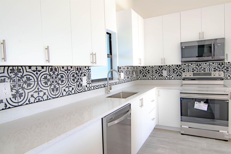 Furnished interior view inside a new home in , Port Charlotte (Image 12).