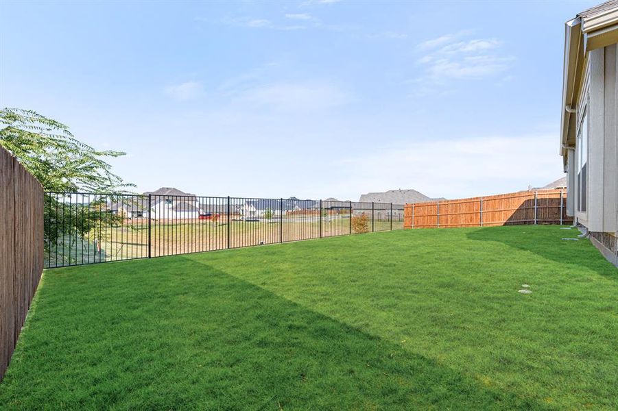 Exterior details and patio area of a home in Parks at Panchasarp Farms 55-60, Burleson (Image 23).