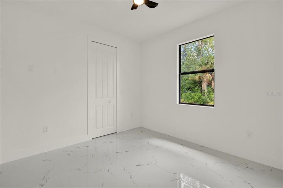 Spacious, unfurnished interior of a new home in , Port Charlotte (Image 35).