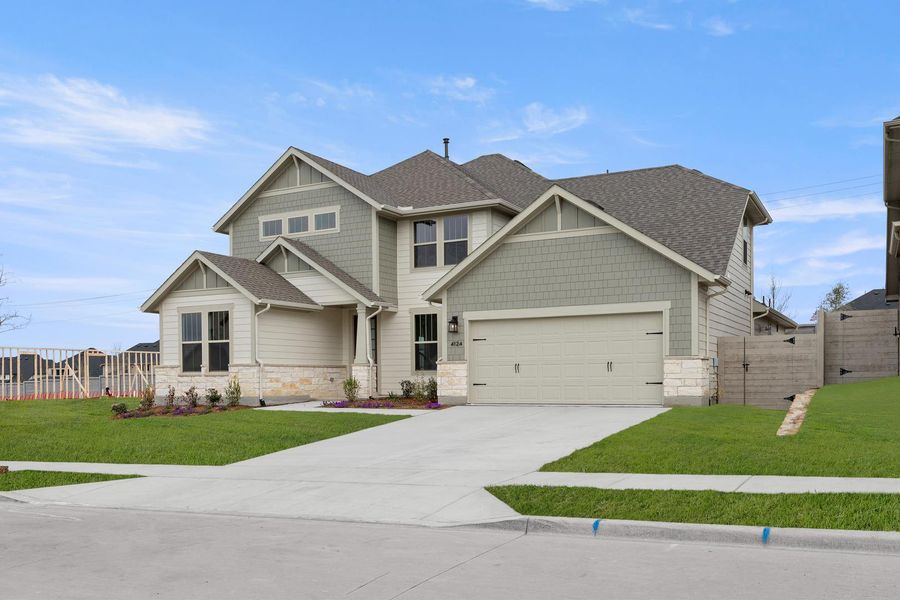 Front exterior of a new home in Painted Tree, McKinney, TX, highlighting curb appeal (Image 2). Front exterior of a new home in Painted Tree, McKinney, TX, highlighting curb appeal (Image 2).