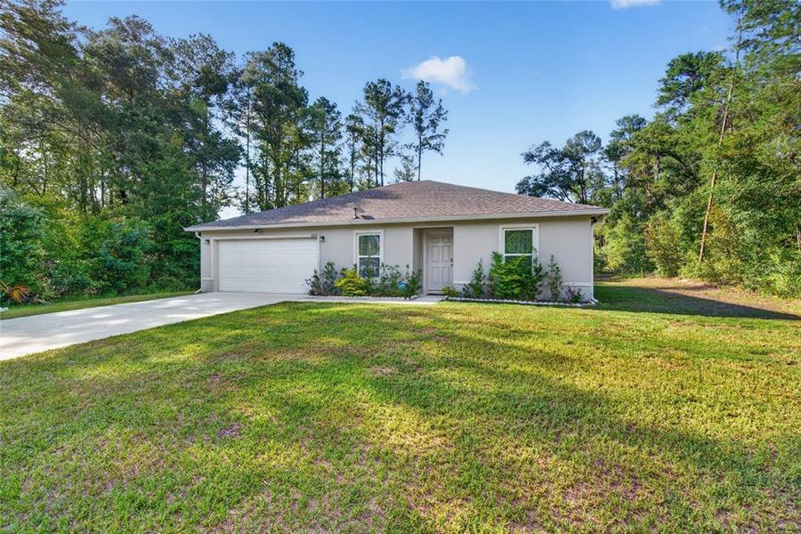 Front exterior of a new home in Ocala, Ocala, FL, highlighting curb appeal (Image 1). Front exterior of a new home in Ocala, Ocala, FL, highlighting curb appeal (Image 1).