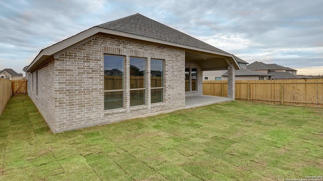 Exterior details and patio area of a home in Kallison Ranch, San Antonio (Image 3).