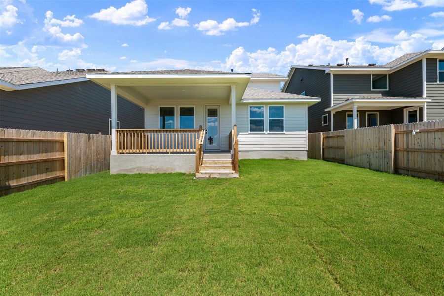 Exterior details and patio area of a home in Cannon Ranch, Dripping Springs (Image 15).