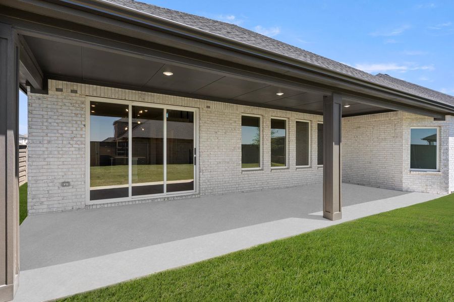 Exterior details and patio area of a home in Union Park, Little Elm (Image 20). Exterior details and patio area of a home in Union Park, Little Elm (Image 20).