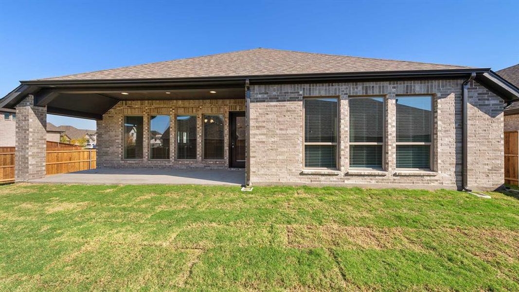 Exterior details and patio area of a home in Devonshire - Reserve 50', Forney (Image 2). Exterior details and patio area of a home in Devonshire - Reserve 50', Forney (Image 2).