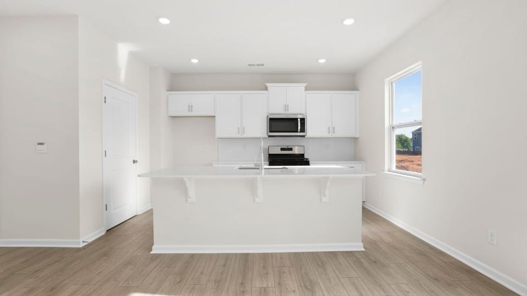 Furnished interior view inside a new home in Durbin Meadows Traditions, Fountain Inn (Image 8).