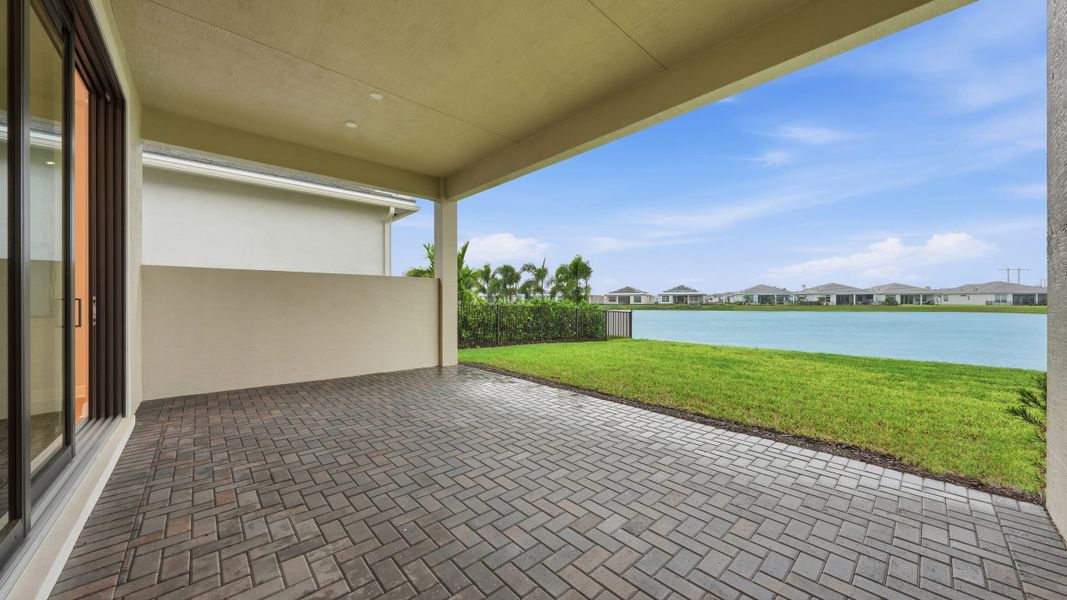 Exterior details and patio area of a home in PGA Village Verano, Port St. Lucie (Image 3).
