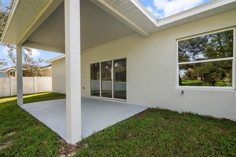 Exterior details and patio area of a home in SummerCrest, Ocala (Image 23).