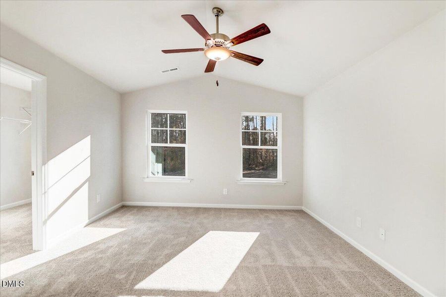 28-Primary bedroom with ceiling fan in N
