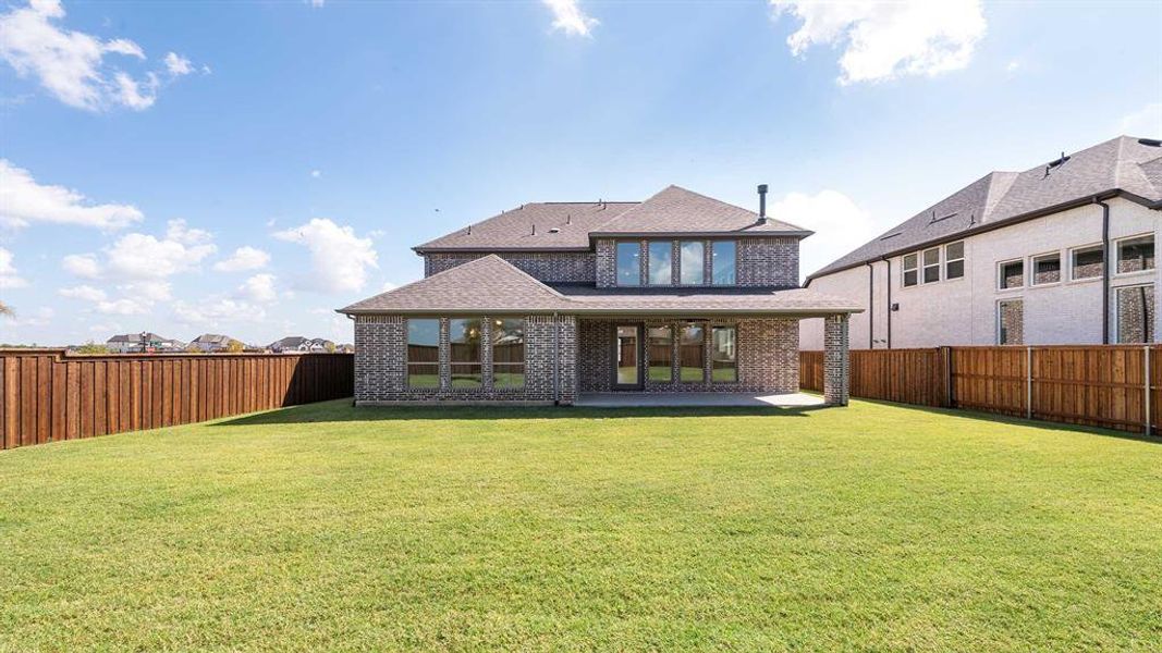 Exterior details and patio area of a home in Mosaic 50', Celina (Image 3).