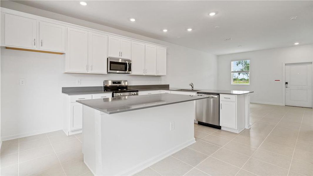 Furnished interior view inside a new home in , Apopka (Image 3).