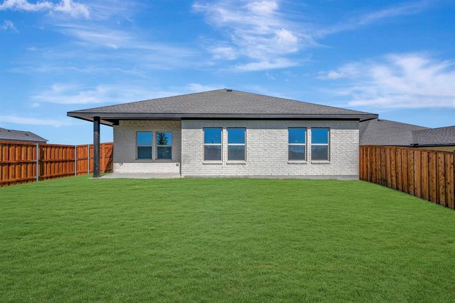 Exterior details and patio area of a home in Aspire at Noble Ridge, Howe (Image 24).
