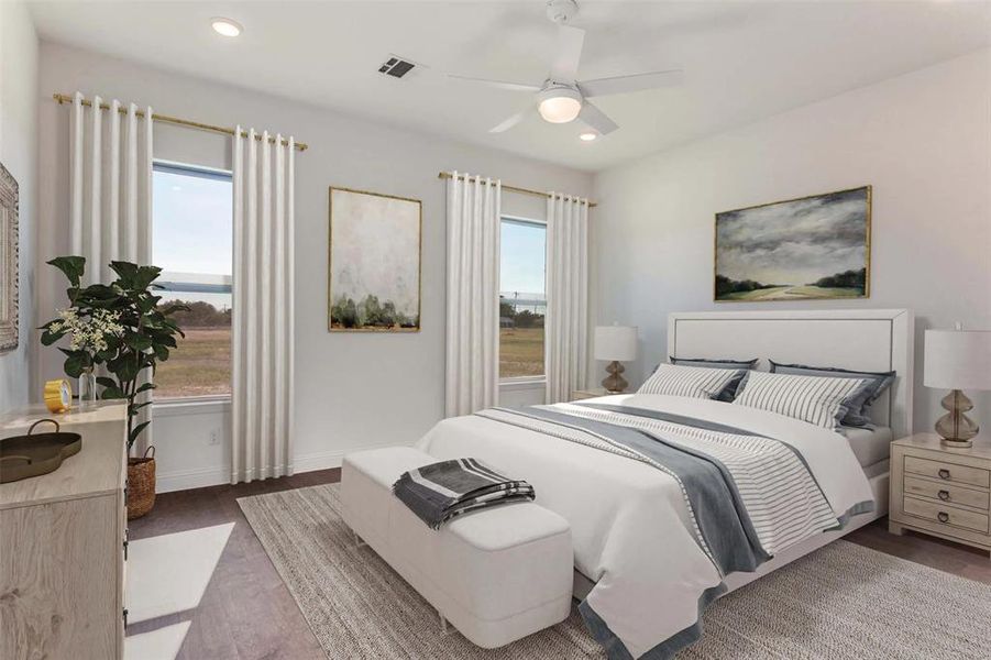 Bedroom featuring dark wood-style flooring, recessed lighting, and a ceiling fan Bedroom featuring dark wood-style flooring, recessed lighting, and a ceiling fan