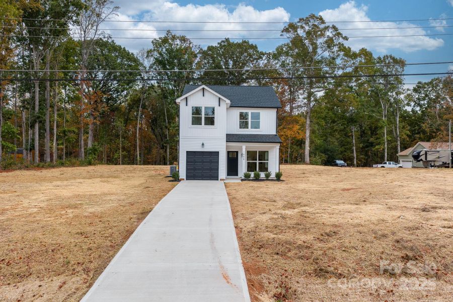 Front exterior of a new home in , Newton, NC, highlighting curb appeal (Image 2). Front exterior of a new home in , Newton, NC, highlighting curb appeal (Image 2).