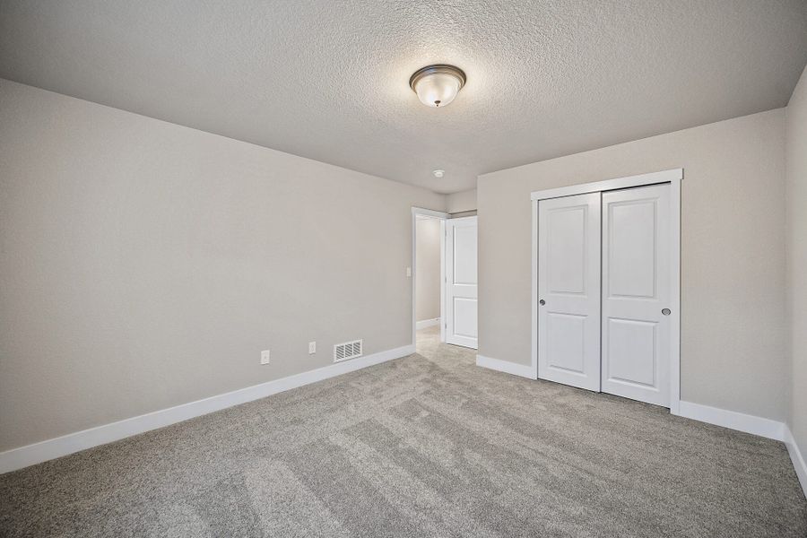 Spacious, unfurnished interior of a new home in The Glen-12, Colorado Springs (Image 45).