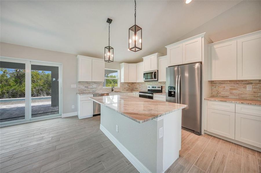 Furnished interior view inside a new home in , Port Charlotte (Image 7). Furnished interior view inside a new home in , Port Charlotte (Image 7).