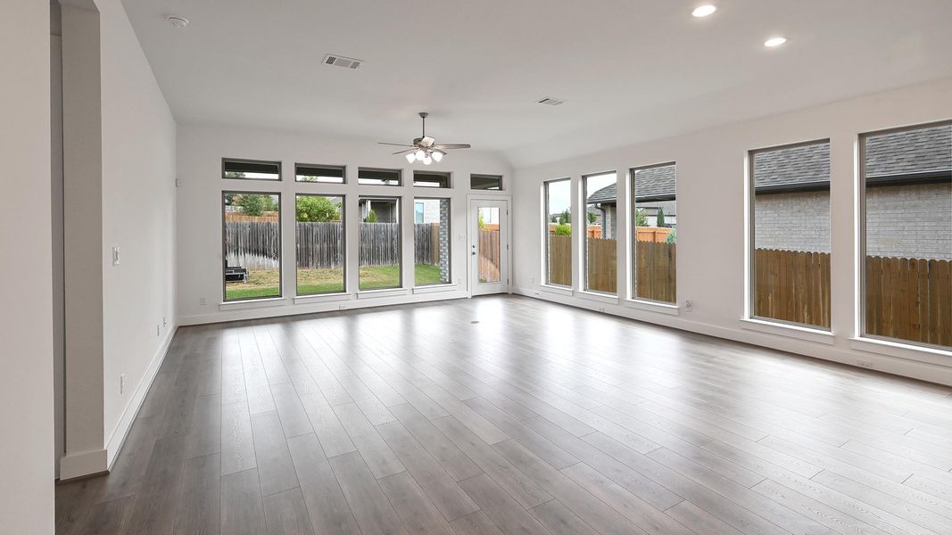 Unfurnished room featuring recessed lighting, ceiling fan, and wood finished floors Unfurnished room featuring recessed lighting, ceiling fan, and wood finished floors