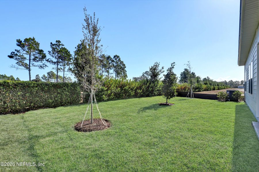 Exterior details and patio area of a home in New 55+ Active Adult Community in Palm Coast, Florida, Palm Coast (Image 16).