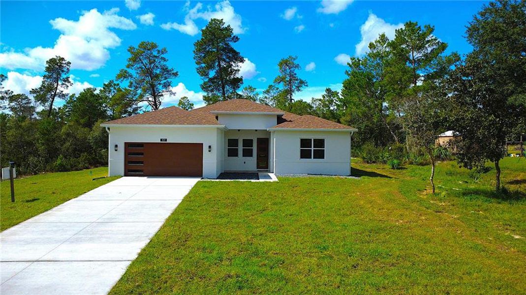 Front exterior of a new home in , Eustis, FL, highlighting curb appeal (Image 29).