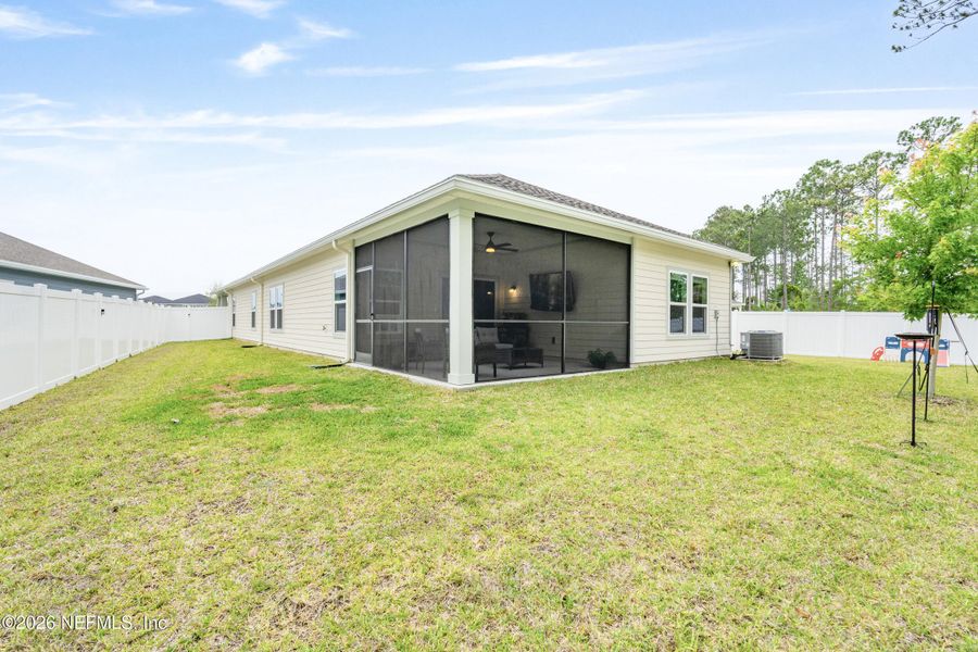 Exterior details and patio area of a home in Concourse Crossing, Fernandina Beach (Image 26).