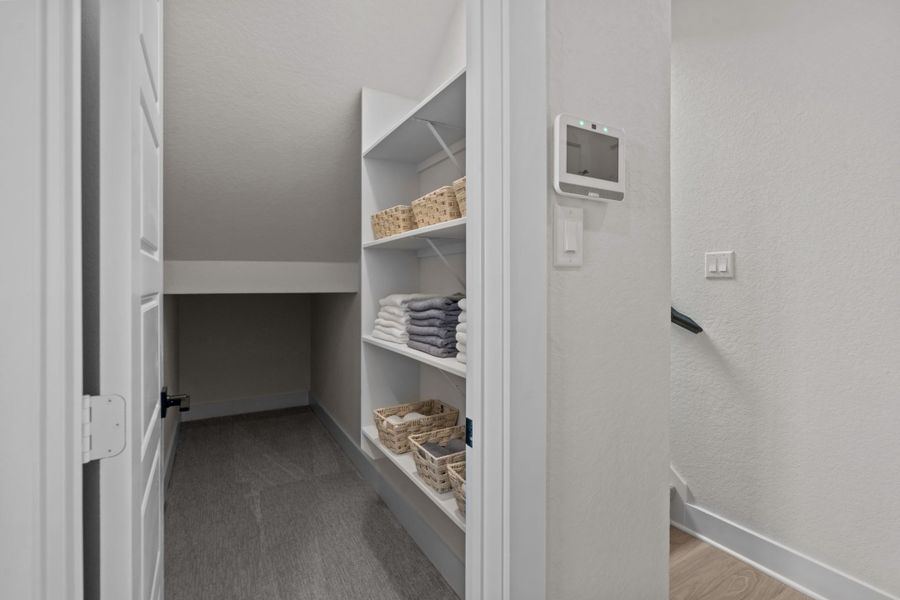 Furnished interior view inside a new home in Prominence, San Antonio (Image 31).