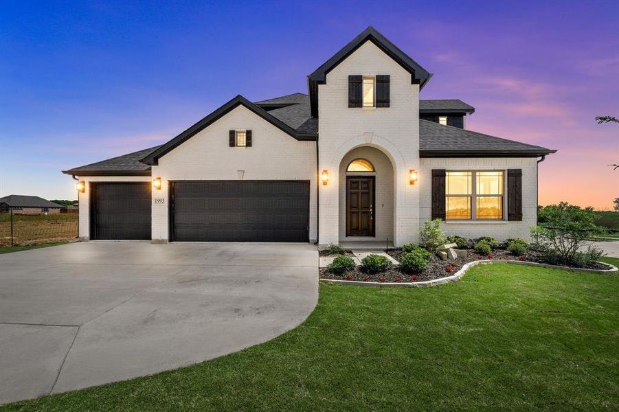 Front exterior of a new home in , Venus, TX, highlighting curb appeal (Image 17).