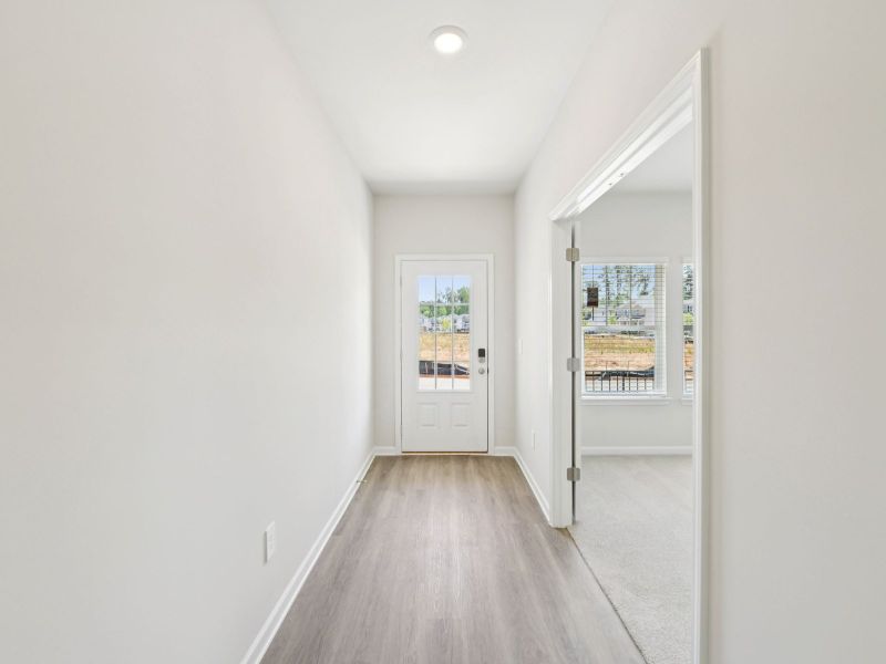 Spacious, unfurnished interior of a new home in Vines at Mill Creek - Estate Series, Braselton (Image 9).