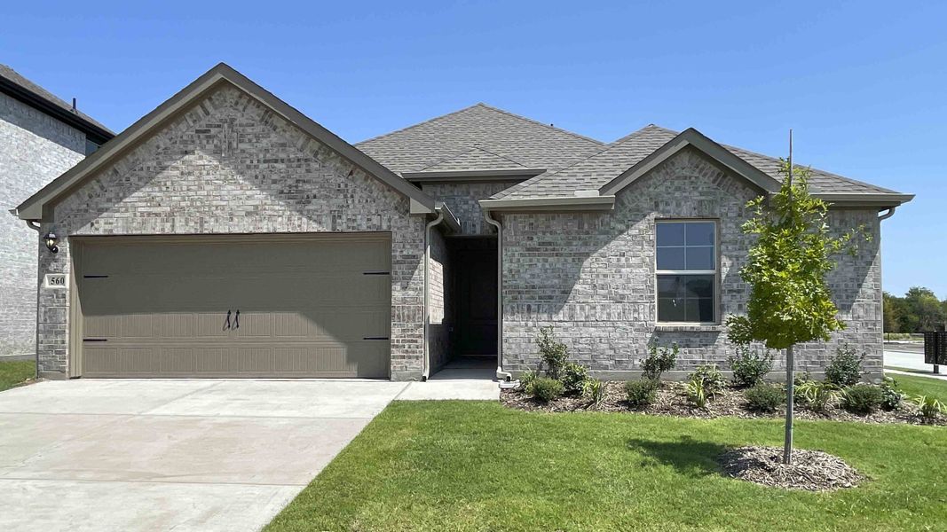 Front exterior of a new home in Elevon, Lavon, TX, highlighting curb appeal (Image 1). Front exterior of a new home in Elevon, Lavon, TX, highlighting curb appeal (Image 1).