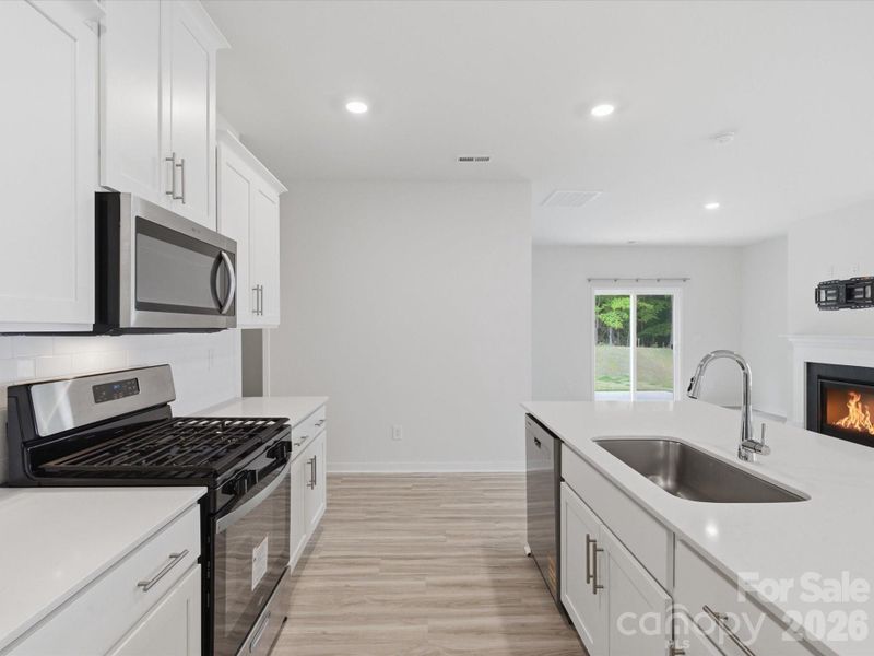 Furnished interior view inside a new home in Reedy Creek Preserve, Charlotte (Image 19).