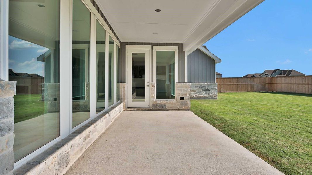 Exterior details and patio area of a home in Fulshear Lakes, Fulshear (Image 4). Exterior details and patio area of a home in Fulshear Lakes, Fulshear (Image 4).