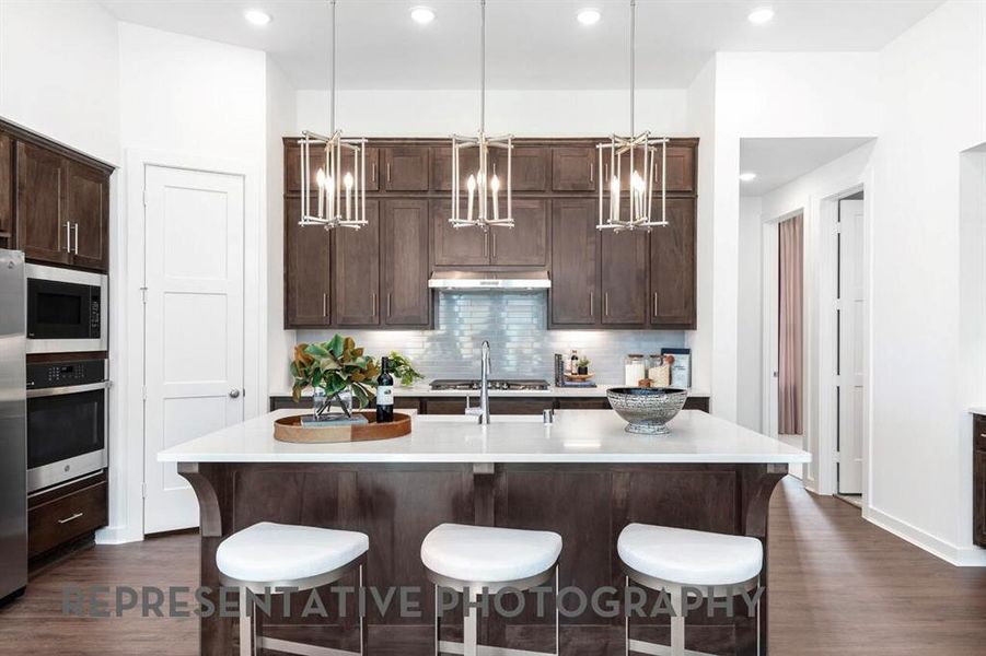Furnished interior view inside a new home in Wildridge, Oak Point (Image 18).