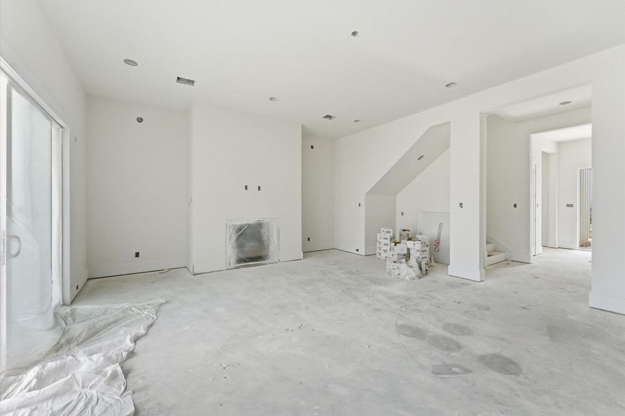 Open-concept living area with a dry bar for entertaining.