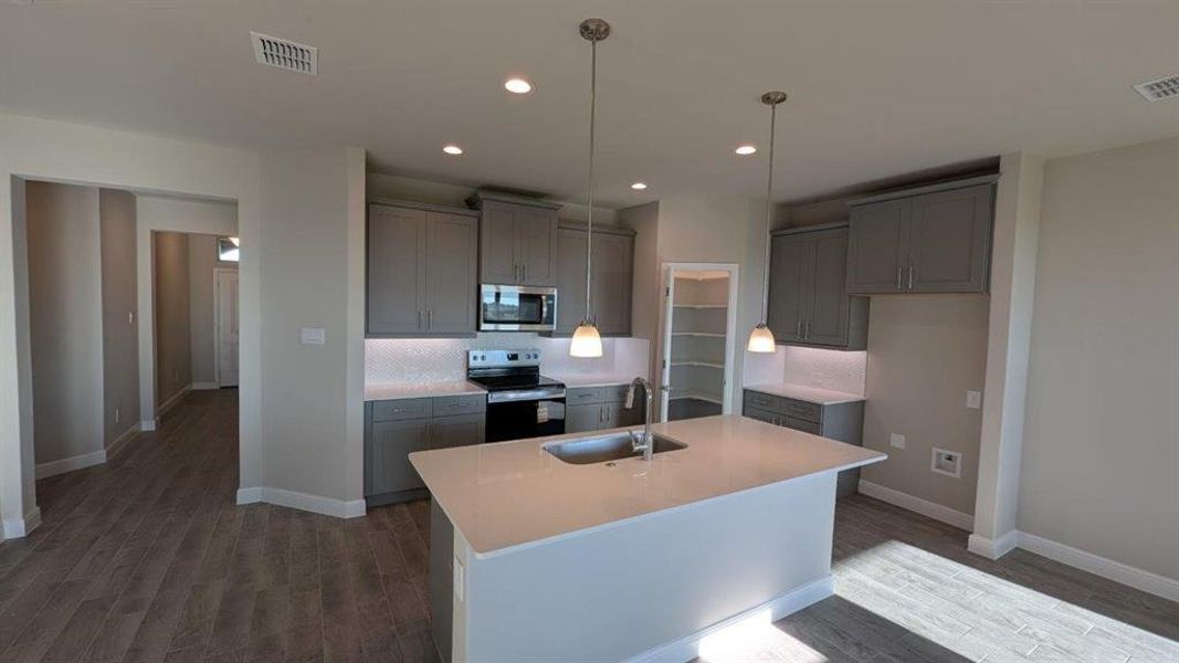 Kitchen - All Home and community information, including pricing, included features, terms, availability and amenities, are subject to change at any time without notice or obligation. All Drawings, pictures, photographs, video, square footages, floor plans, elevations, features, colors and sizes are approximate for illustration purposes only and will vary from the homes as built. Kitchen - All Home and community information, including pricing, included features, terms, availability and amenities, are subject to change at any time without notice or obligation. All Drawings, pictures, photographs, video, square footages, floor plans, elevations, features, colors and sizes are approximate for illustration purposes only and will vary from the homes as built.